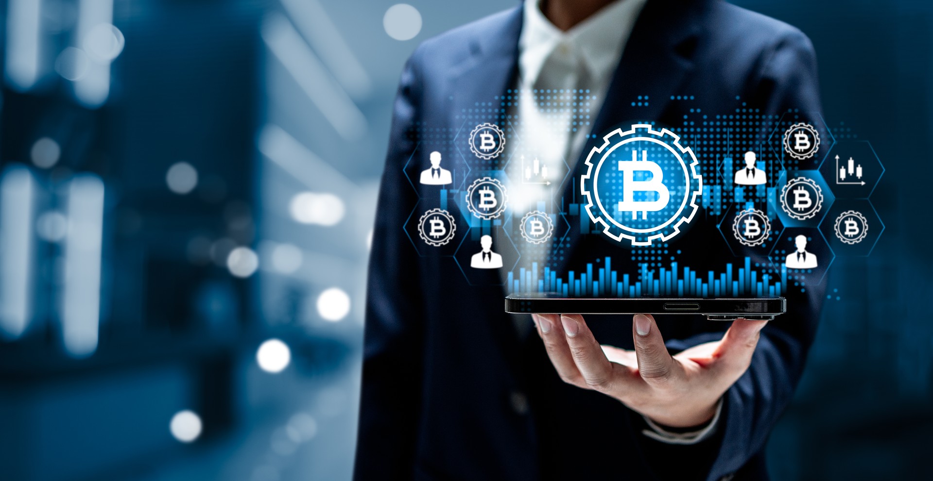 Businesswomen showing cryptocurrency graphs on a virtual screen of bitcoin currency on smartphones, financial and investment platform digital networks, blockchain concepts. Businesswomen showing cryptocurrency graphs on a virtual screen of bitcoin currency on smartphones, financial and investment platform digital networks, blockchain concepts.